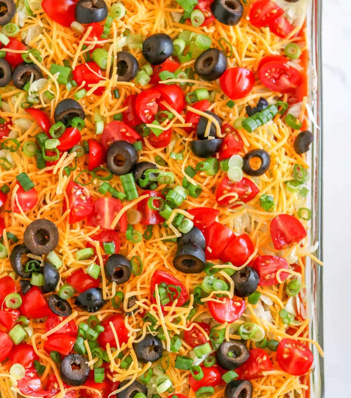 Layered Taco Dip with White Beans- toppings