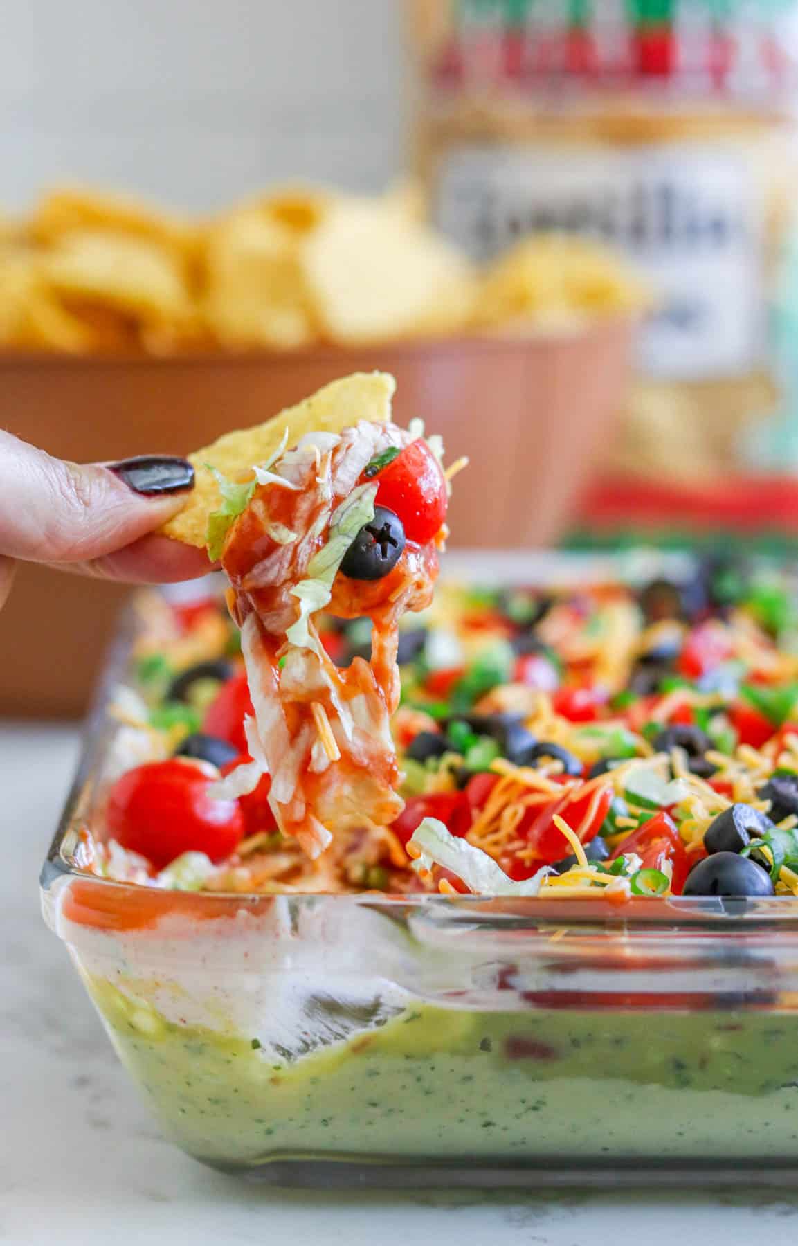 layered taco dip with white beans- gluten free chips