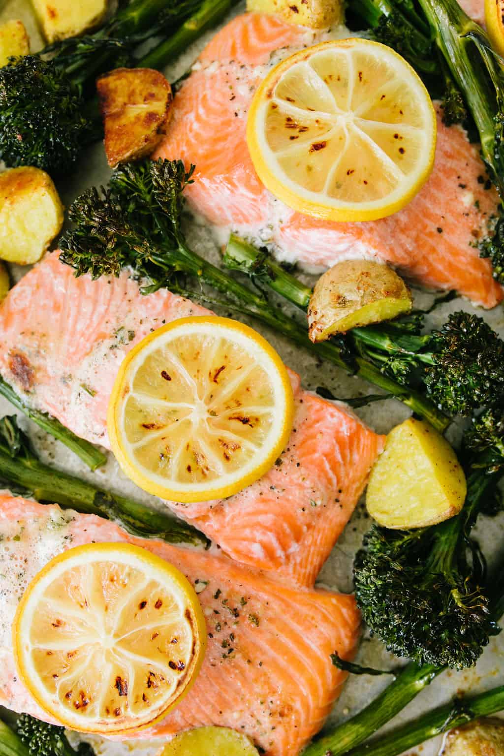 sheet pan salmon dinner up close in pan