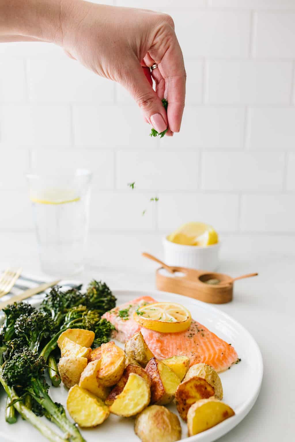 sheet pan salmon dinner parsley sprinkles