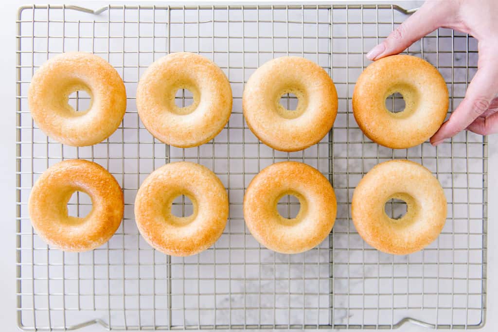 Baked Vegan Cake Donuts cooling on rack