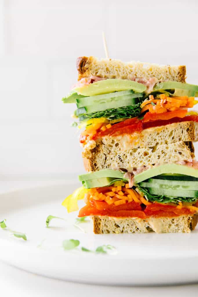 Rainbow Veggie Sandwich Gluten Free sliced in half and stacked