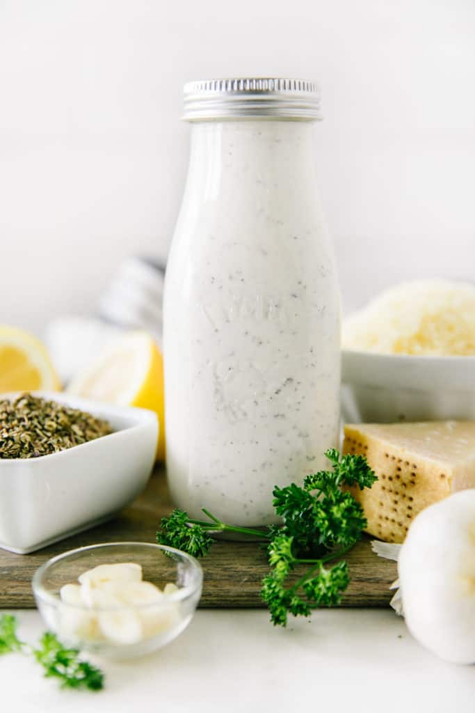 The Best Homemade Ranch Dressing- dressing in a glass bottle