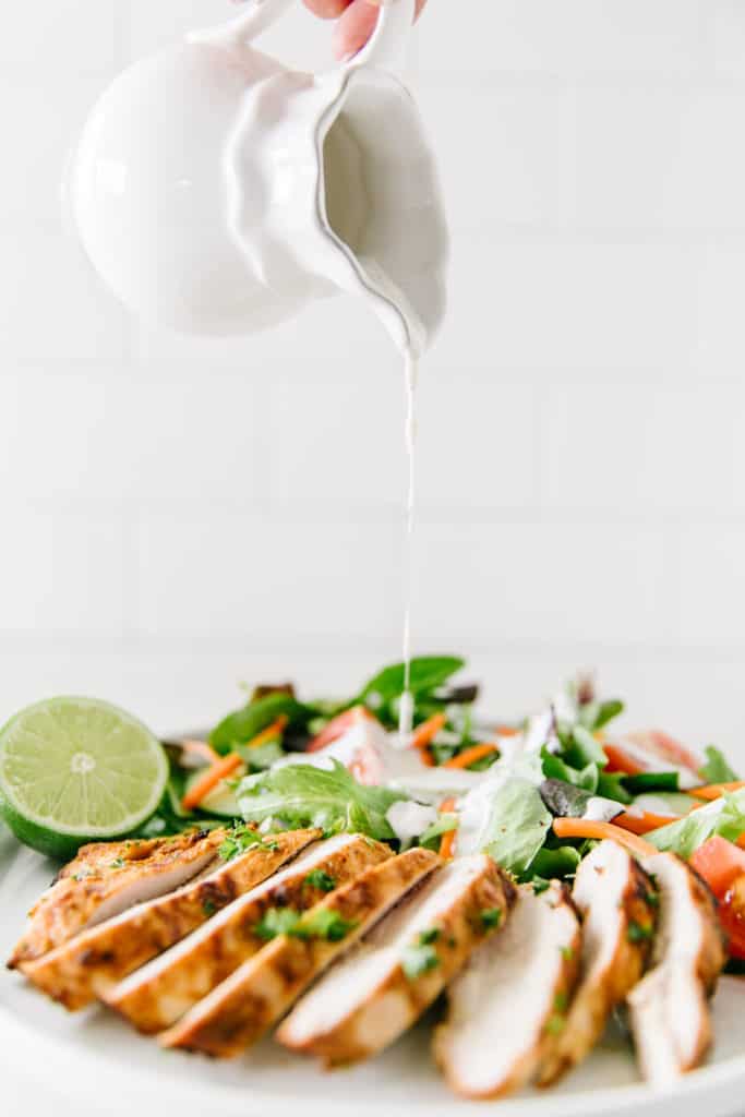 The best grilled chicken served with salad and ranch dressing