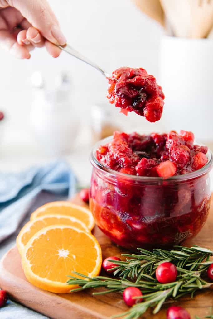 Cranberry chutney on a spoon for serving 