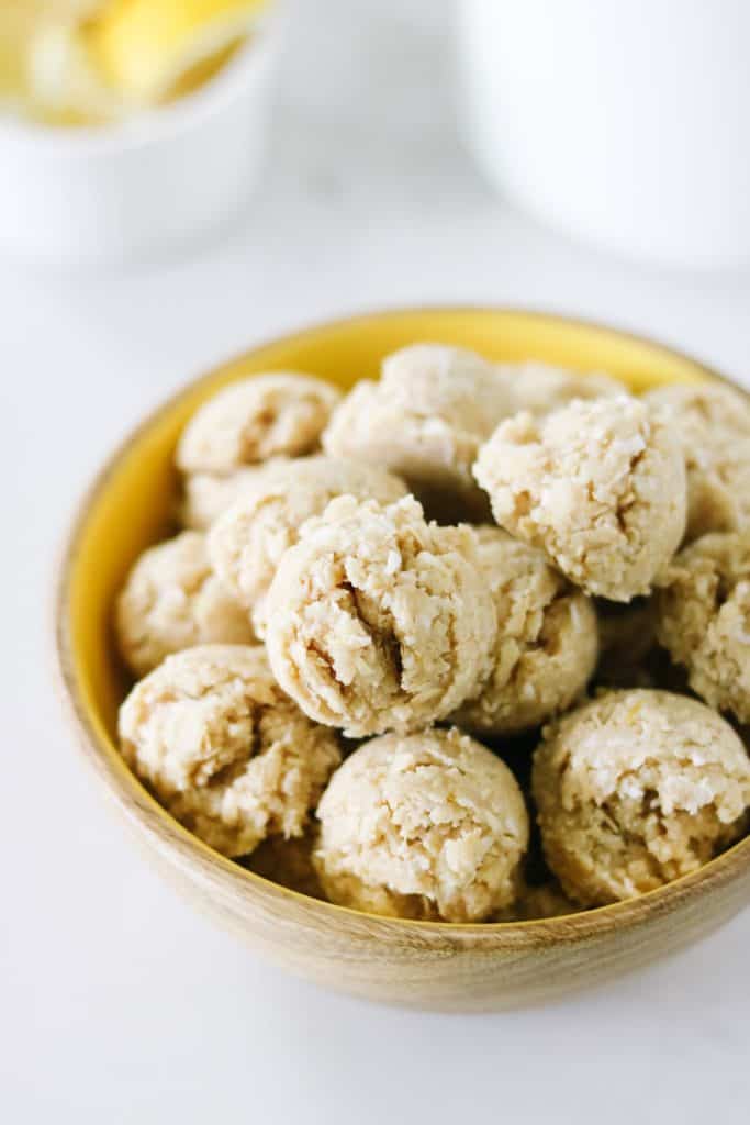 Luscious lemon powerballs in a yellow bowl